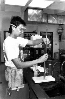 Student conducts an experiment, St. Cloud State University