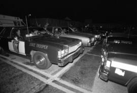 Police cars parked before the homecoming riot, St. Cloud State University