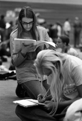 Two women register for classes at Halenbeck Hall (1965), St. Cloud State University