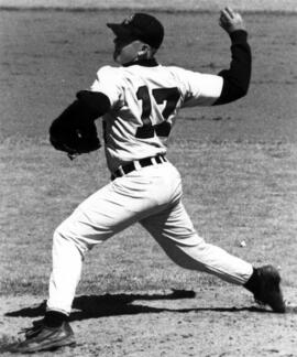 Baseball pitcher Tim Klinnert throws a ball during a baseball game against St. Scholastica, St. Cloud State University