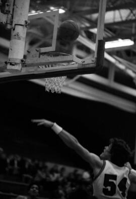St. Cloud State University basketball player Dan Hagen goes for a rebound during a game against the University of Minnesota-Duluth