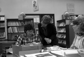 Kathy Farrell helps students in the Curriculum Materials Laboratory, College of Education, St. Cloud State University