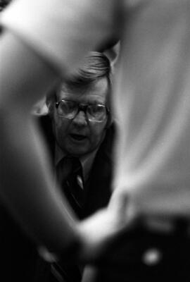 Noel Olson coaches during a basketball game, St. Cloud State University