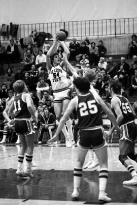 St. Cloud State University basketball player Dan Hagen shoots a basketball during a game against Bemidji State University