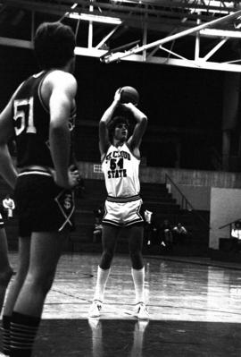 St. Cloud State University basketball player Dan Hagen throws free throws during a basketball game against St. Thomas University