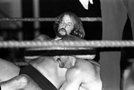 Wrestler Rene Goulet headlocks his opponent at Halenbeck Hall (1965), St. Cloud State University