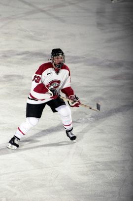 Hockey player Mike Rucinski plays during a game against the University of Wisconsin