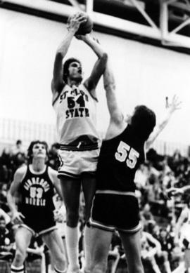 St. Cloud State University basketball player Dan Hagen shoots a basketball during a game