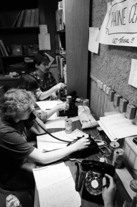 People answer telephones during the KVSC trivia weekend, St. Cloud State University