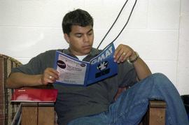 Advanced Preparation Program student reads a magazine, St. Cloud State University