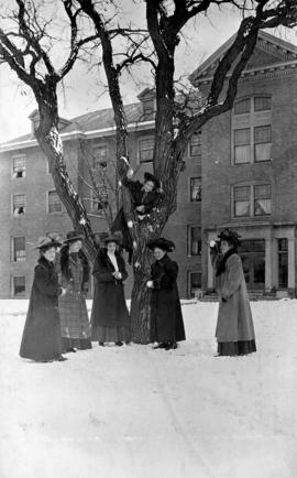 Female students prepare for a snowball fight, St. Cloud State University