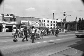 Protestors march on the street, Day of Peace protest, St. Cloud State University