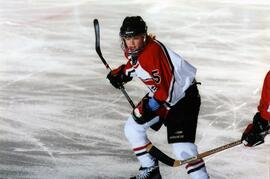 Hockey player Alison Ribar skates during a game, St. Cloud State University