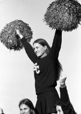 Cheerleaders at the homecoming football game, St. Cloud State University