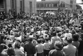 Protestors gather at a building, Day of Peace protest, St. Cloud State University