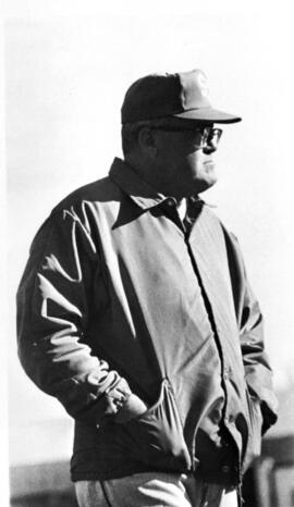 "Jim Stanek looks toward the plate from his third-base coaching box," St. Cloud State University