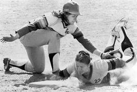 Laurie Stary tags Janelle Christiansen during a softball game, St. Cloud State University