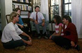 Group sits in Lewis House (1973), St. Cloud State University