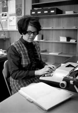 Ann Shaw uses a typewriter, St. Cloud State University