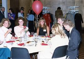 People sit together at a table during the Excellence in Leadership banquet, St. Cloud State University