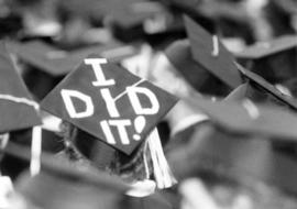 Hat at commencement reads "I Did It", St. Cloud State University