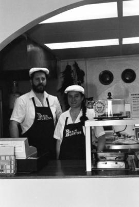 Workers inside Bravo Burrito in St. Cloud