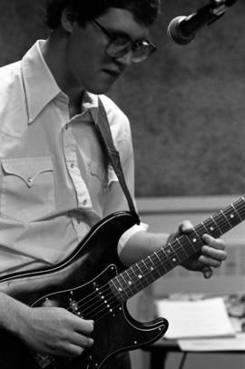 Jeff Wood of the band Almost Gentlemen plays the guitar, St. Cloud State University