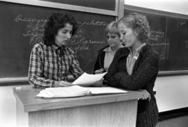 Faculty member speaks to two Social Work students, St. Cloud State University