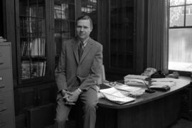 St. Cloud State president Charles Graham in his office in Whitney House (1956)