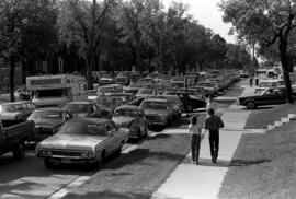 Cars crowd in front of Mitchell Hall (1958) during Move In Day, St. Cloud State University