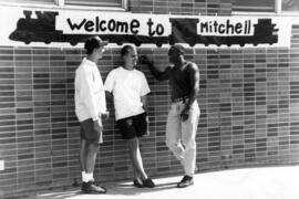 Students talk near Mitchell Hall (1958), St. Cloud State University