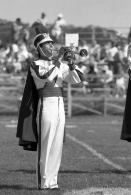 Marching band performs at a football game, St. Cloud State University