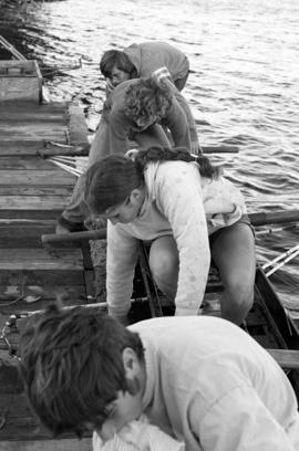 Rowing Club members prepare their boat, St. Cloud State University