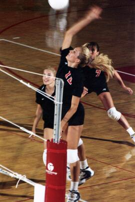 Cami Selbitschka spikes a volleyball during a volleyball match against Augustana College, St. Cloud State University