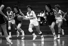Dawn Anderson runs with a basketball during a game against the University of South Dakota, St. Cloud State University