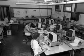 Graduate students use the Riverview (1913) computer laboratory, St. Cloud State University