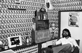 Jeff Bisek sits in his dormitory room, St. Cloud State University