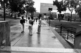 Students gather on a sidewalk outside of Atwood Memorial Center (1966), St. Cloud State University
