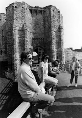 Students relax outside of Alnwick Castle, St. Cloud State University