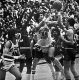 Dan Hagen grabs a basketball, St. Cloud State University