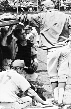 "Mike Schneider, Denny Lorsung and Dan Jensen chat on the dugout steps," St. Cloud State University