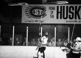 A St. Cloud State hockey player celebrates a goal, St. Cloud State University