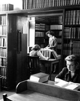 Female students study at the library, St. Cloud State University