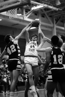 Bruce Anderson grabs a rebound during a basketball game against the University of Minnesota-Duluth, St. Cloud State University