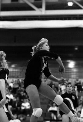 Sheri Mandell hits a volleyball during a volleyball match, St. Cloud State University