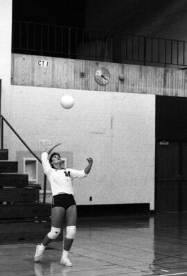 Kathy Davis serves a volleyball during a volleyball match, St. Cloud State University