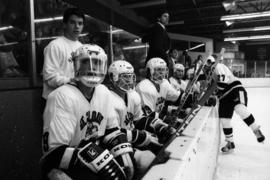 Men's hockey coach John Perpich coaches during a game against Bemidji State University