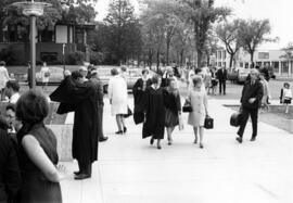 People arrive for graduation at Halenbeck Hall (1965), St. Cloud State University