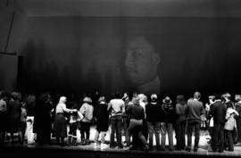 Audience comes up on stage in the Stewart Hall (1948) auditorium to sing "We Shall Overcome" at the Martin Luther King Jr. birthday celebration, St. Cloud State University