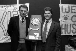 Herb Brooks and Bill Ries with the 1987 3rd place Division III hockey trophy, St. Cloud State University